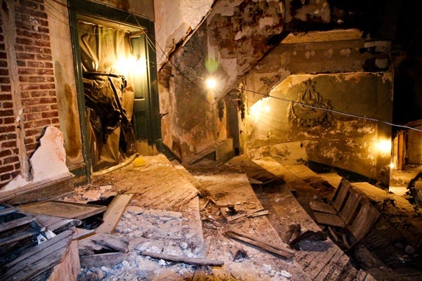 <p><p>A few relics from the Metropolitan Opera House's previous life compete with ceiling debris on the balcony. (Kimberly Paynter/for NewsWorks)</p></p>
