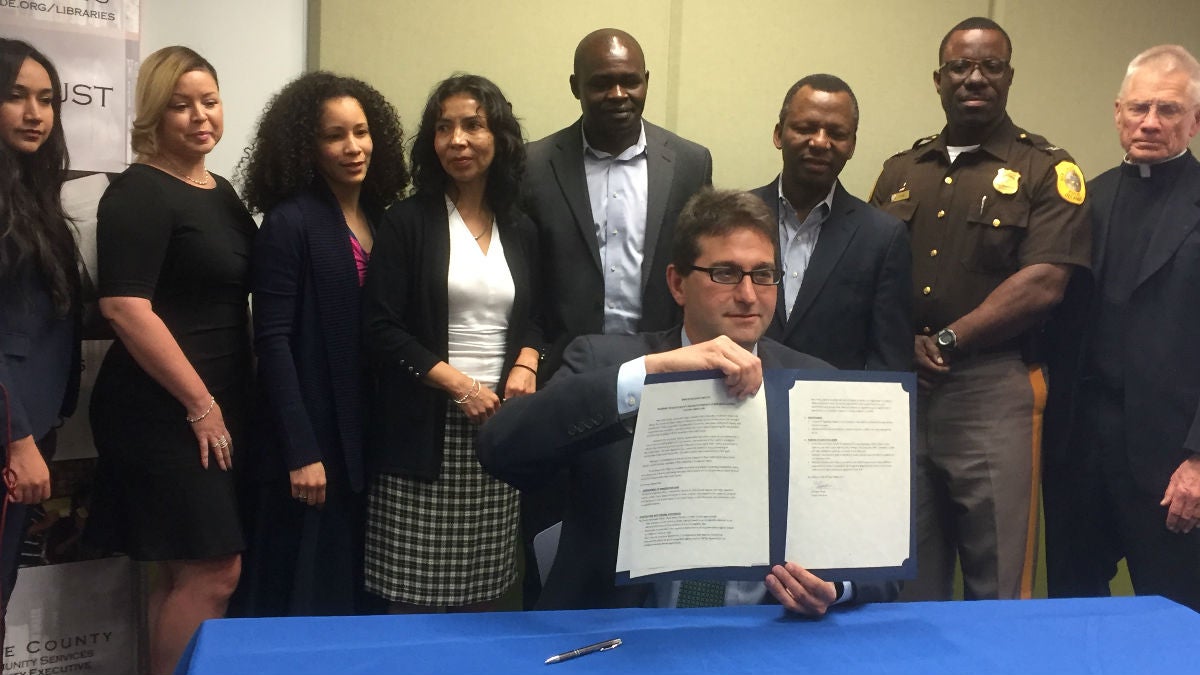  County Executive Matt Meyer signed an executive order that aims to protect the immigrant community. (Zoë Read/WHYY) 