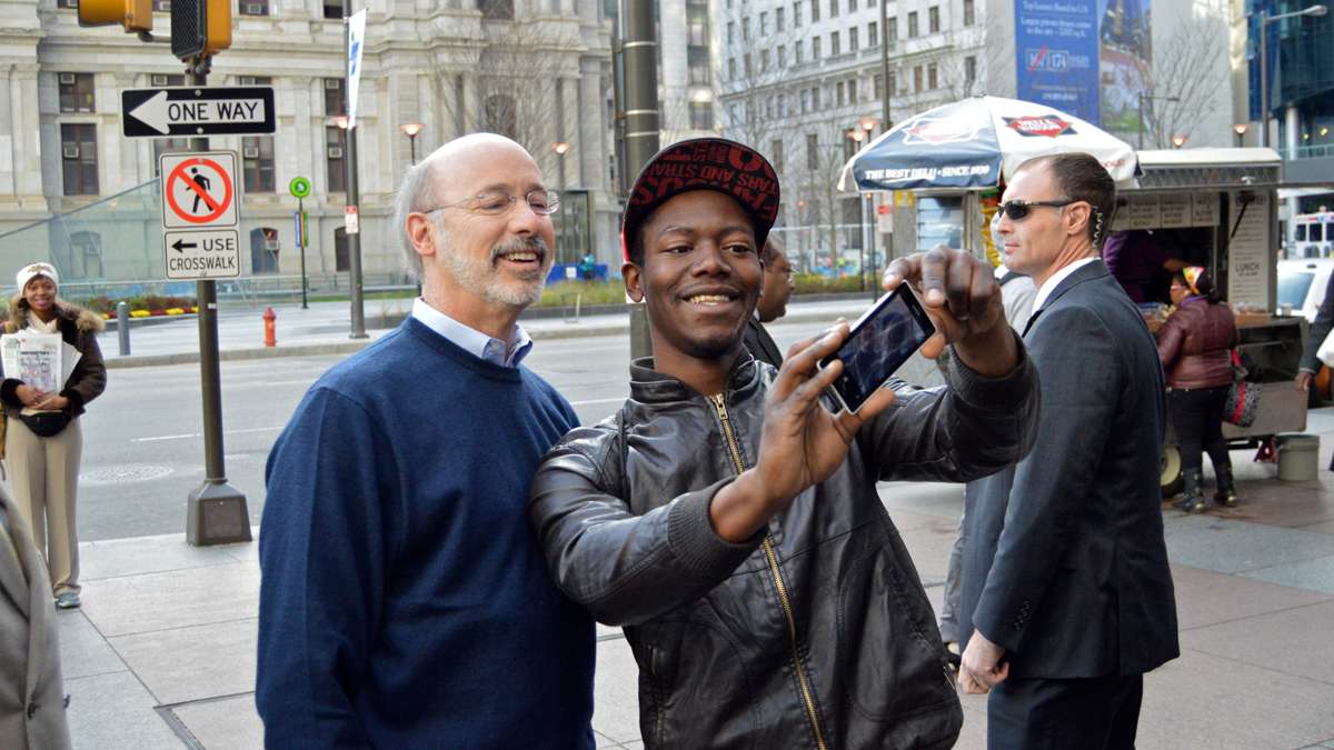 Tom Wolf stops for a selfie while strolling Center City on election morning. (Tom MacDonald/WHYY)