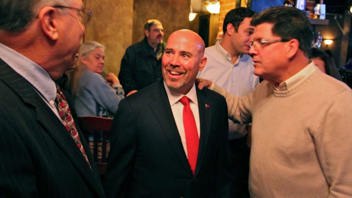 Tom MacArthur (center), who is running to fill the 3rd District Congressional seat being vacated by former Eagle Jon Runyan, is received affectionately by fellow republicans at Marlton Tavern in Burlington County as his campaign draws to a close. (Emma Lee/WHYY)