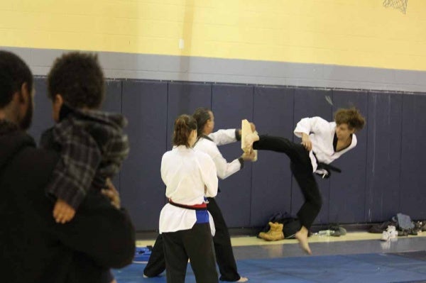 <p><p>The next generation of black belts looks on as Hidden Tiger Karate Studio performs (Photo courtesy of FOMS). </p></p>
