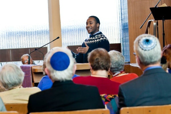 <p><p>Abdul Azizz performs spoken word during an interfaith celebration at the Germantown Jewish Centre. (Brad Larrison/for NewsWorks)</p></p>
