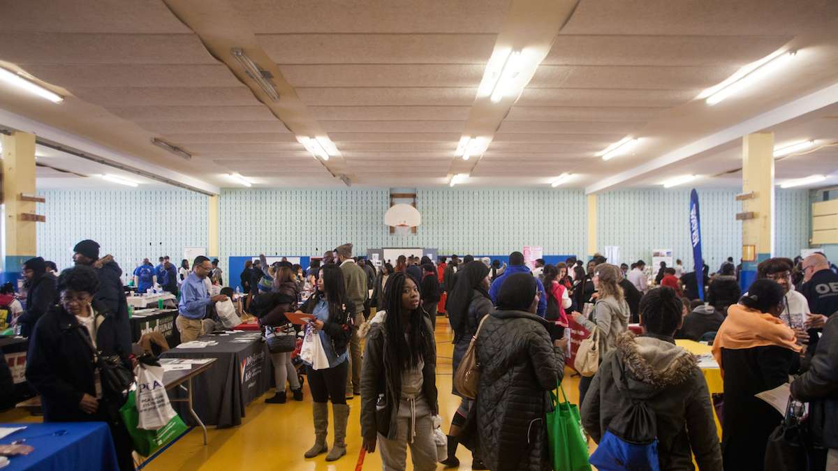 Philadelphians walk through a job and services fair at Girard College on Martin Luther King Day 2017. (Brad Larrison for NewsWorks)