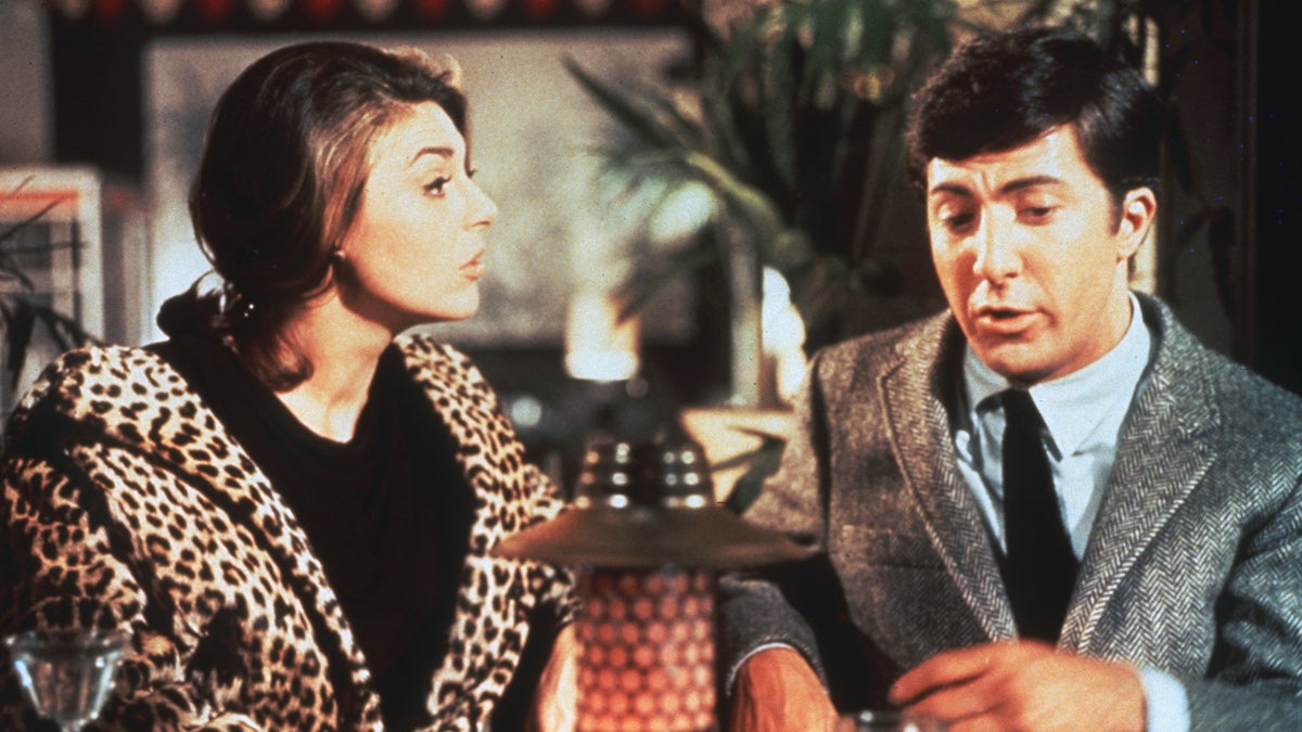  In this publicity still, actors Anne Bancroft and Dustin Hoffman appear in a scene from the 1967 film 