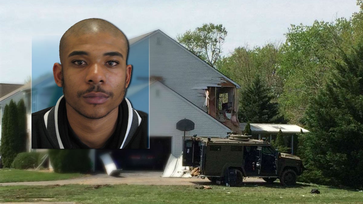  Burgon Sealy was arrested nearly four years ago on gun and drug charges in Florida. He was killed by police following a nearly 20 hour standoff at his Middletown home. (Sealy photo courtesy Del. State Police/home photo: Shirley Min/WHYY) 
