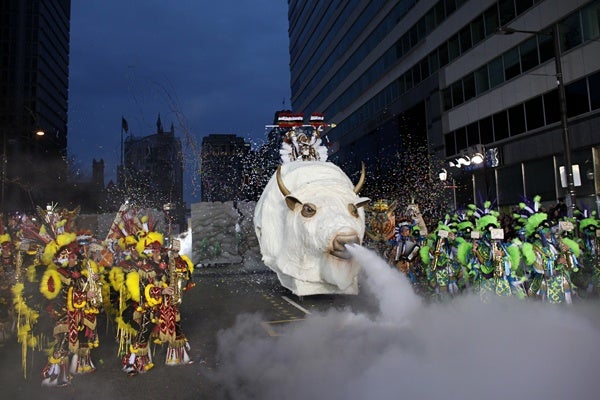 <p>Members of the Quaker City String Band perform for judges during the 113th annual Mummers Parade in Philadelphia, on Tuesday Jan. 1, 2013. (AP Photo/Joseph Kaczmarek)</p>
