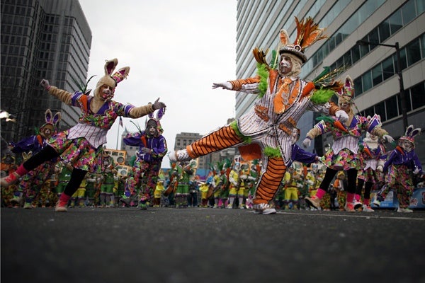 <p>People participate in the 113th annual Mummers Parade in Philadelphia, on Tuesday Jan. 1, 2013. (AP Photo/Joseph Kaczmarek)</p>

