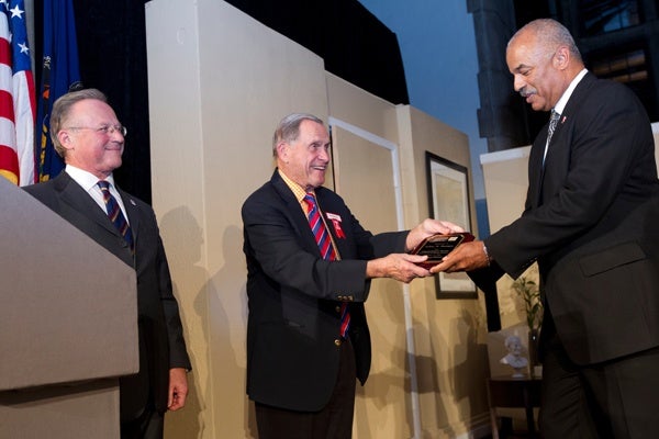 <p><p>M. Moshe Porat, congratulates School of Tourism and Hospitality Management Assistant Dean Jeffrey Montague on his Excellence in Administrative Service Award as Musser Awards namesake Warren V. “Pete” Musser looks on. (Photo courtesy of Ryan S. Brandenberg)</p></p>

