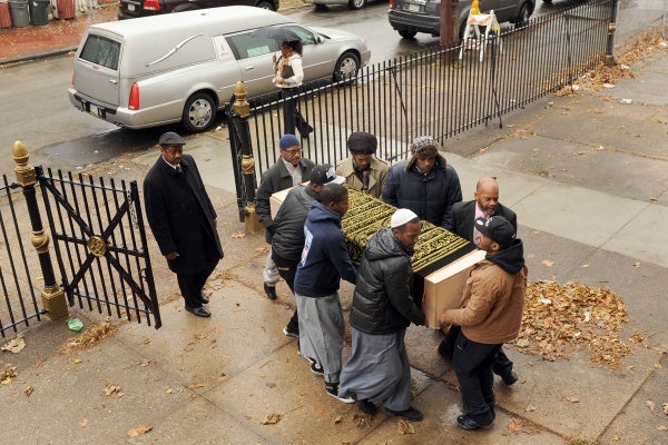 <p><p>The body of Najji Abdul-Rahim, 19, is carried into Philadelphia Masjid, a mosque at 4700 Wyalusing Ave. in Philadelphia. (Peter Tobia/for NewsWorks)</p></p>
