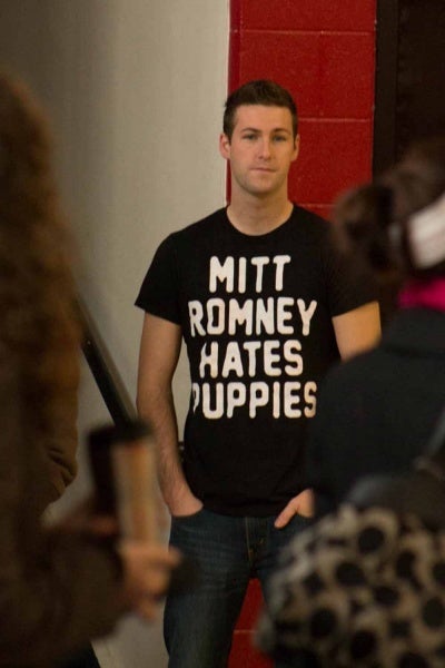 <p><p>A voter at North Light Community Center sports a shirt that says "Mitt Romney hates puppies." (Francis Hilario/for NewsWorks)</p></p>
