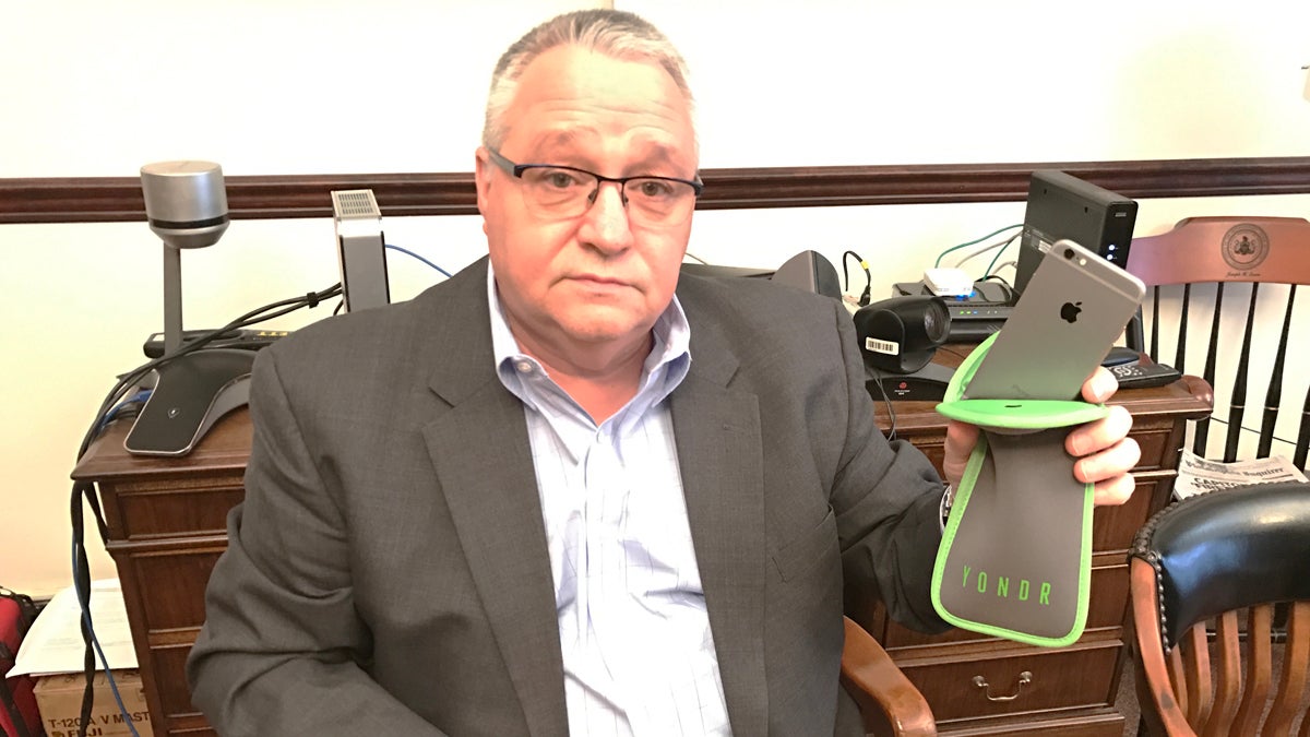  Joseph Evers, First Judicial District Court administrator, says, starting in April, most visitors to Philadelphia's criminal courthouse will have to put their phones in a locked pouch. (Bobby Allyn/WHYY) 