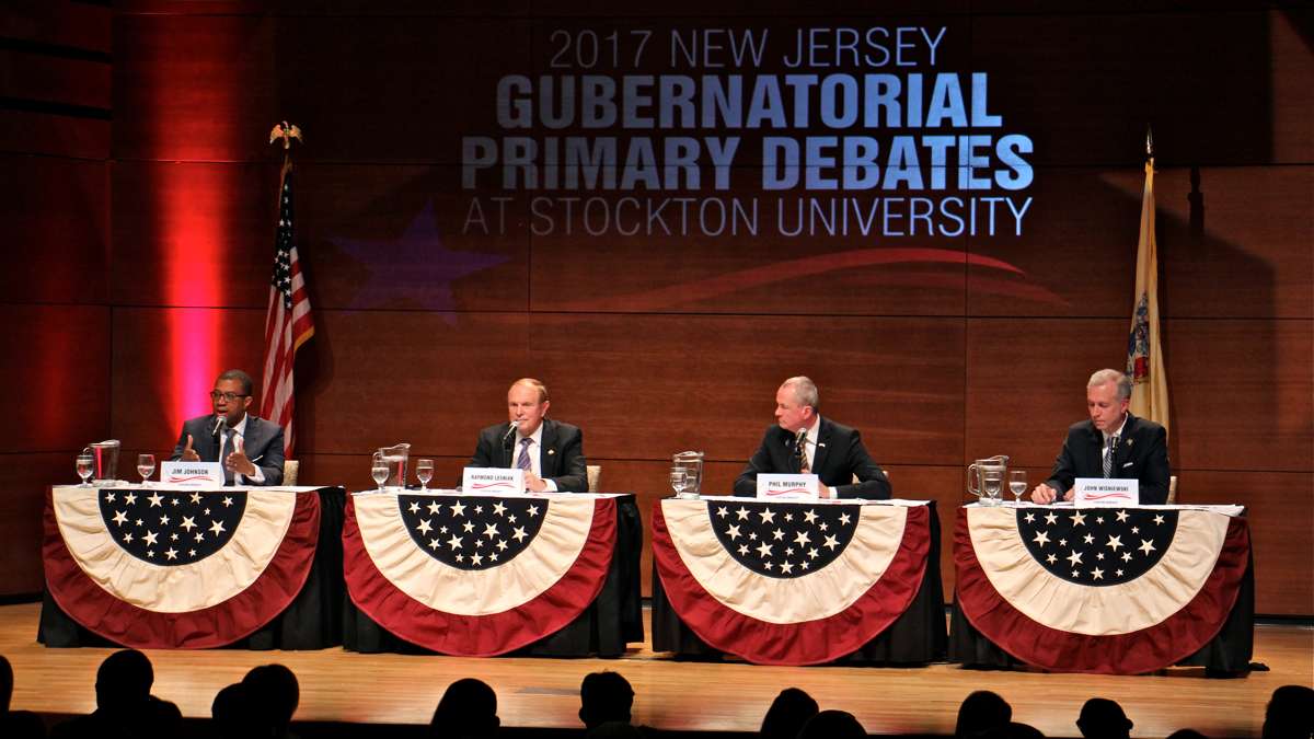  New Jersey Democratic gubernatorial candidates (from left) Jim Johnson, Raymond Lesniak, Phil Murphy, and John Wisniewski, air their views during a debate Tuesday at Stockton University. (Emma Lee/WHYY) 