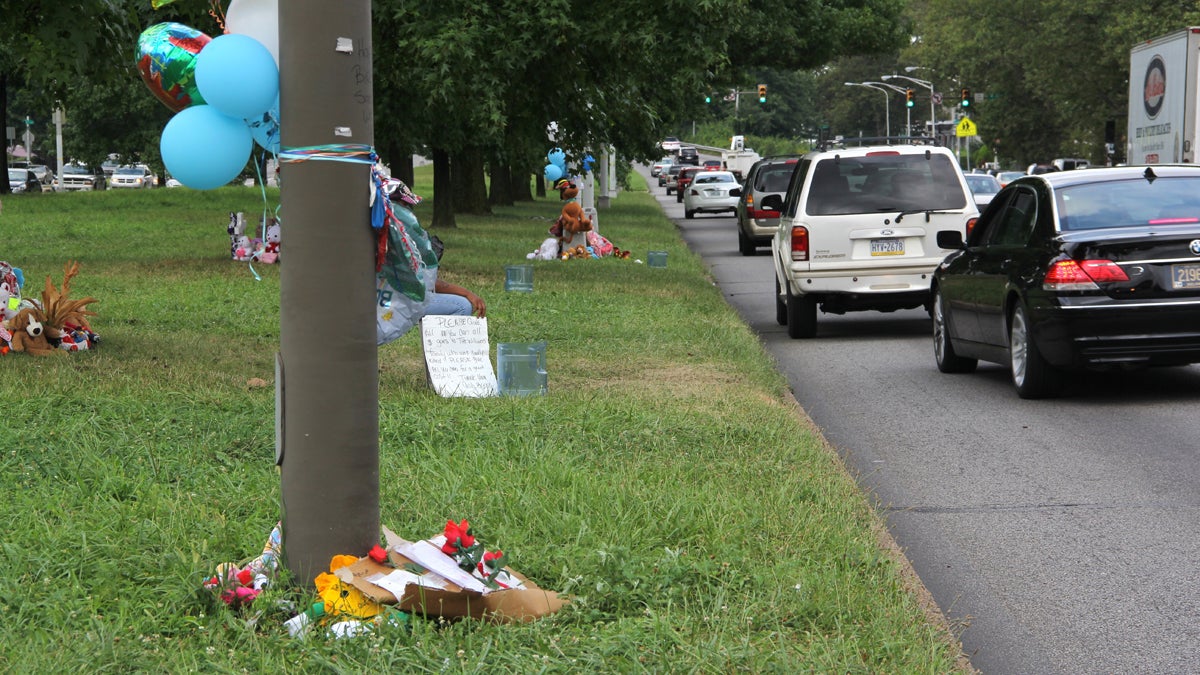 Memorials mark the area of Roosevelt Boulevard near 2nd Street where Samara Banks and three children were killed as they attempted to cross the 12-lane roadway. (Emma Lee/WHYY)