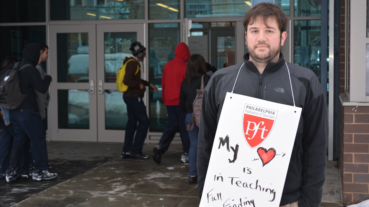  Ray Porecca, special-education teacher at Feltonville School of Arts and Sciences, pickets against budget cuts at a recent rally outside of the school. Porecca was assaulted by a student in his classroom earlier this year (Kevin McCorry/WHYY) 