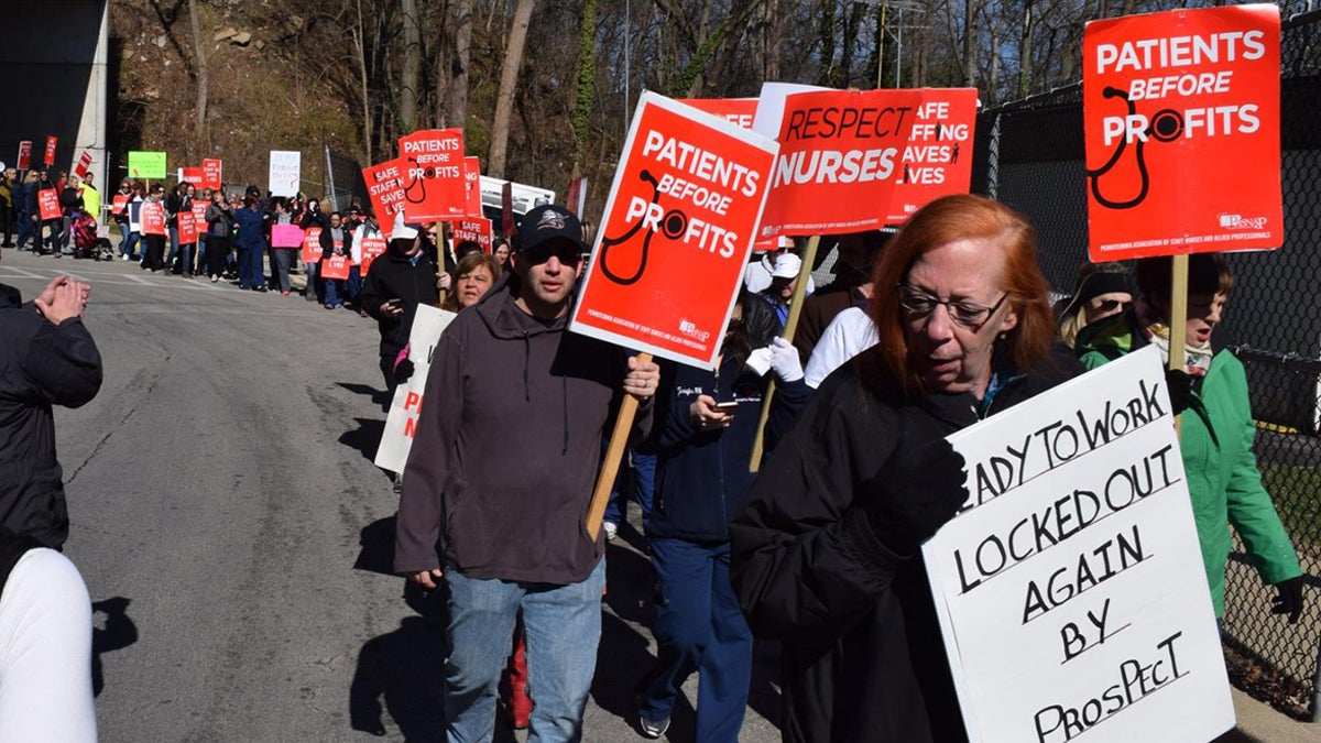  Members of the Pennsylvania Association of Staff Nurses and Allied Professionals  rally during contract negotiations in March. (PASNAP) 