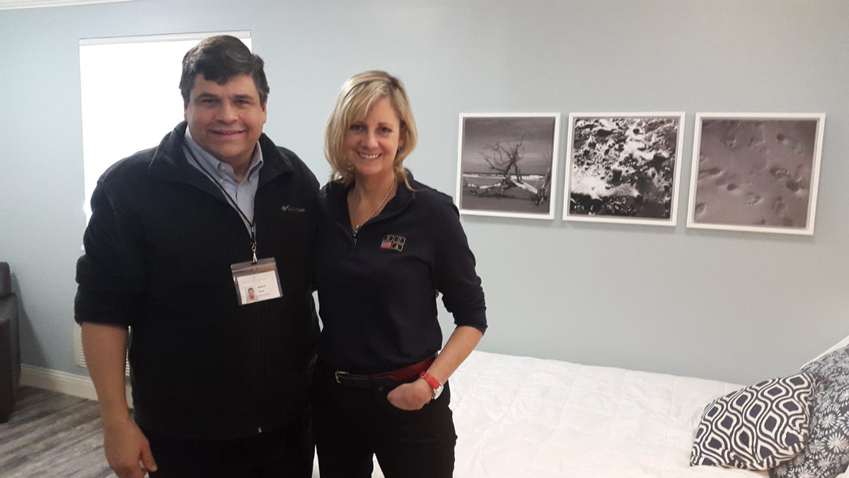  David Dorschu and Deni Carise with Recovery Centers of America standing in a room at the Lighthouse at Mays Landing, a treatment center the company flipped for $1.25 million last year. (Laura Benshoff/WHYY) 