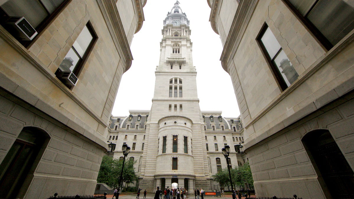 The clock tower of Philadelphia City Hall is seen form the building's courtyard. (Nathaniel Hamilton/for WHYY, file) 