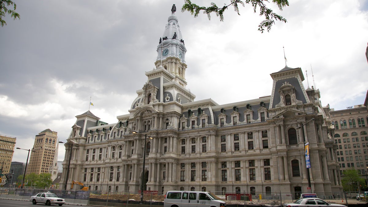  Philadelphia's City Hall, seen under a clouded sky. Those holding city office must continue following the 