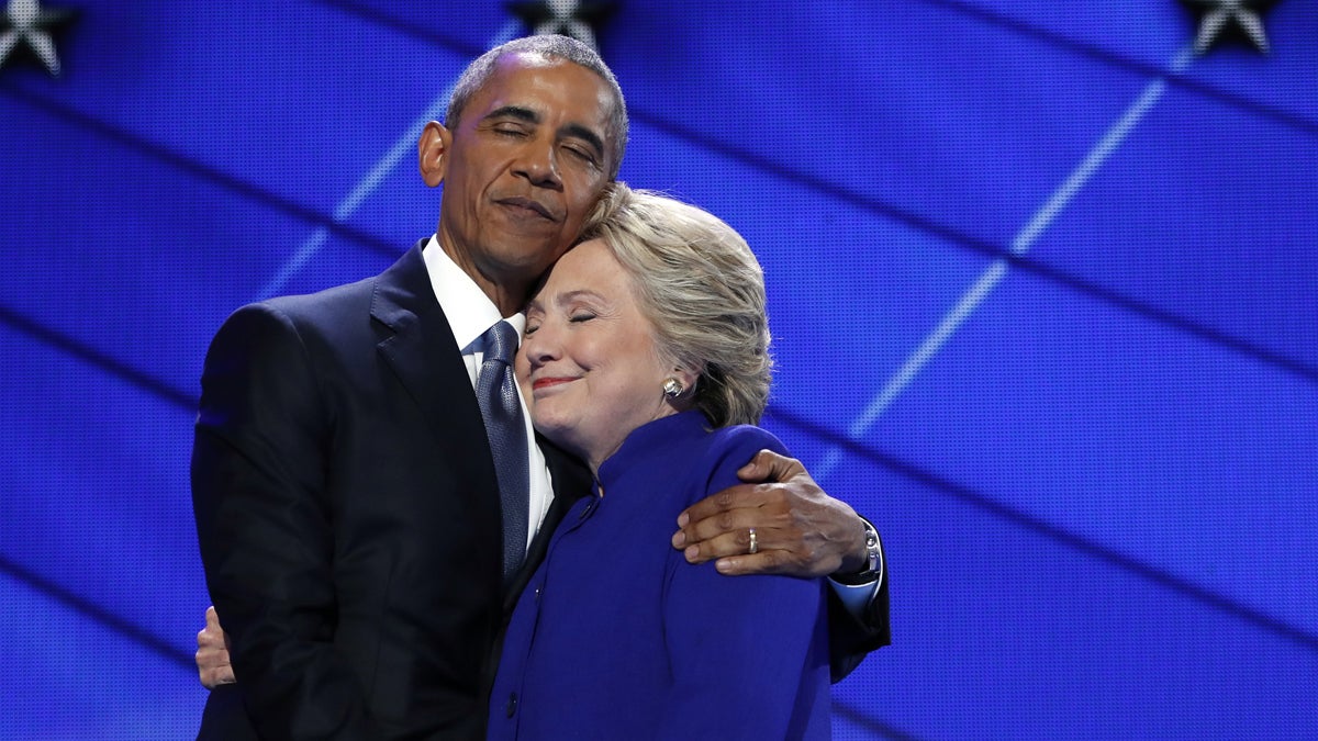  President Barack Obama hugs Democratic Presidential candidate Hillary Clinton after addressing the delegates during the third day of the Democratic National Convention in Philadelphia, Wednesday, July 27, 2016. (AP Photo/Carolyn Kaster) 
