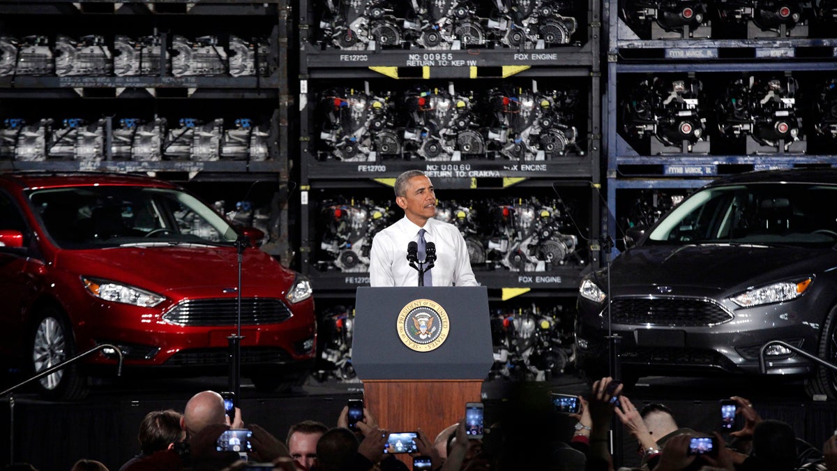  President Barack Obama is shown speaking Ford's Michigan Assembly Plant in Wayne, Mich. Obama touted steps taken by his administration that he said have brought the economy and U.S. manufacturing roaring back to life. (AP Photo/Paul Sancya) 