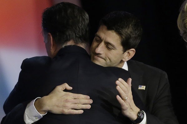 <p>VP candidate Paul Ryan hugs it out with Romney, whose power in the party Ryan may soon overtake.  (AP Photo/David Goldman)</p>
