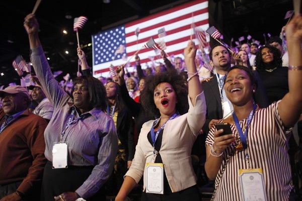 <p>Supporters of President Barack Obama react to favorable media projections at the McCormick Place during an election night watch party in Chicago on Tuesday, Nov. 6, 2012. (AP Photo/Jerome Delay)</p>
