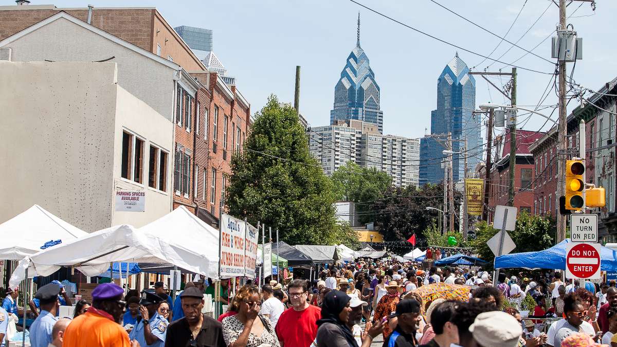 Odunde Festival crowds number in the thousands. The festival covers 12 blocks and is billed as the largest African American street festival in the country.  (Brad Larrison/for NewsWorks)