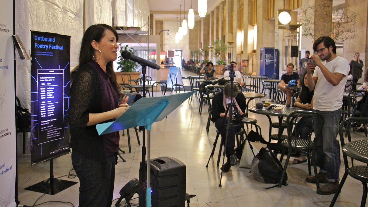  Michelle Myers speaks her poetry at the Outbound Poetry Festival at 30th Street Station. (Emma Lee/WHYY) 
