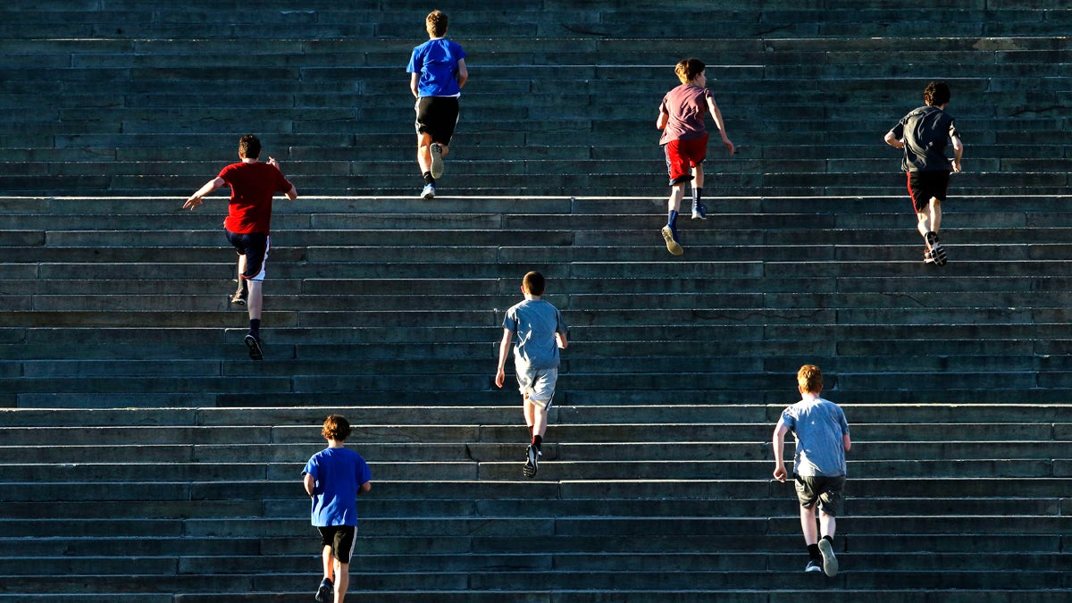  Youngsters run up the steps of the Philadelphia Museum of Art during an unseasonably warm December afternoon in Philadelphia. (AP Photo/Matt Rourke) 