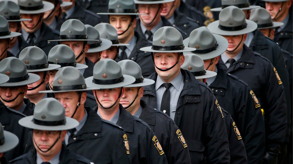Pennsylvania State Police lined the route of the funeral procession for St. Clair Township