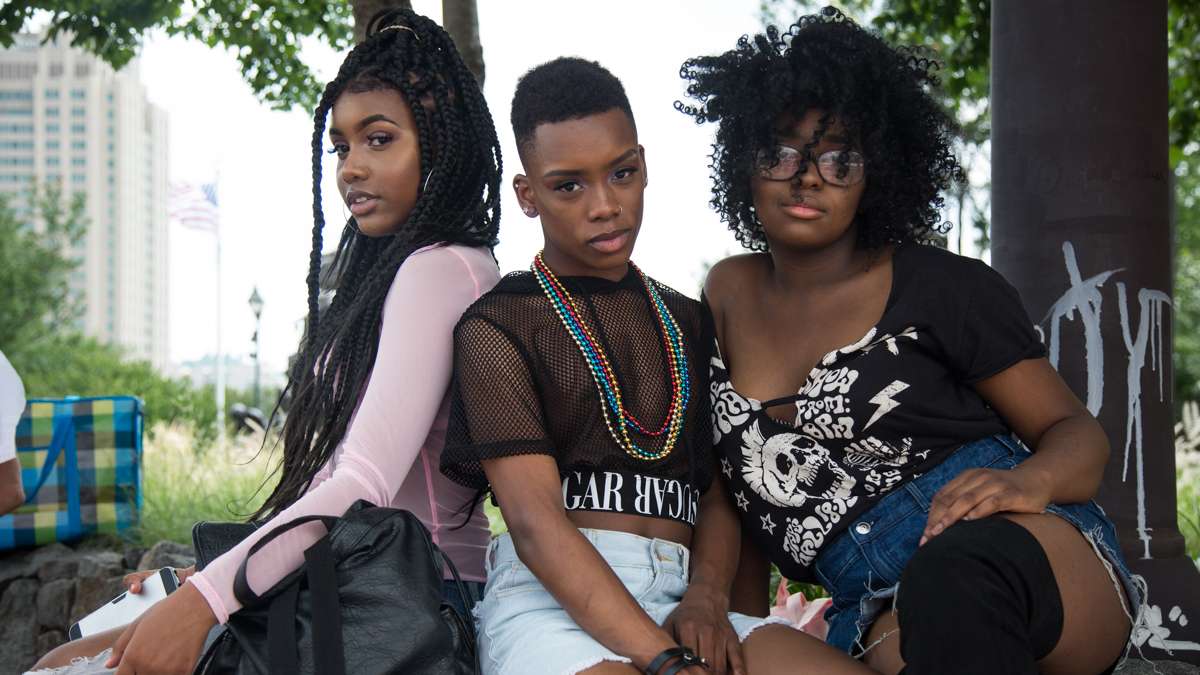 Jordan Cross-Lawrence, 16, and Qyimheir Bradshaw, 17, Pride veterans, (from left) brought their cousin Nakkia Haynes, 13, to her first Pride Festival, Sunday, June 18, 2017.