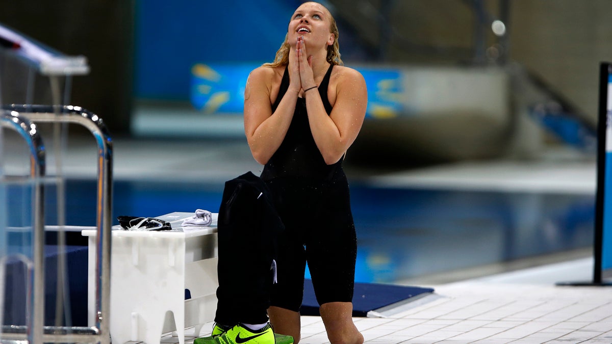  Team USA's Jessica Long reacts after wining the Women's 100m Butterfly S8 category at the 2012 London Paralympic Games. (AP Photo/Emilio Morenatti) 