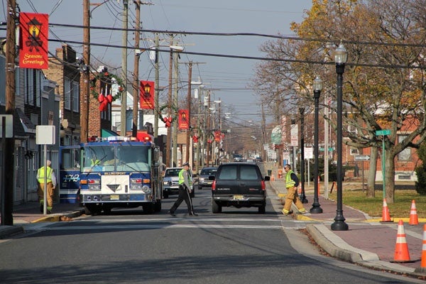 <p>Delaware Avenue is decorated for the holidays, but a 12-block area of the town is off-limits because of a chemical spill. (Emma Lee/for NewsWorks)</p>
