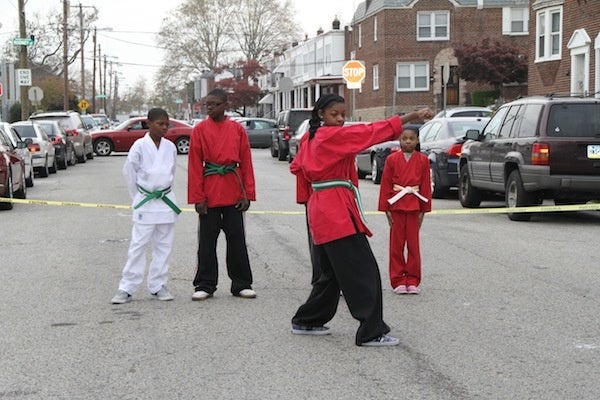 <p><p>The Fighting Angels demonstrate various martial arts poses at Saturday's Fall Festival in West Oak Lane. (Trenae V. McDuffie/for NewsWorks)</p></p>
