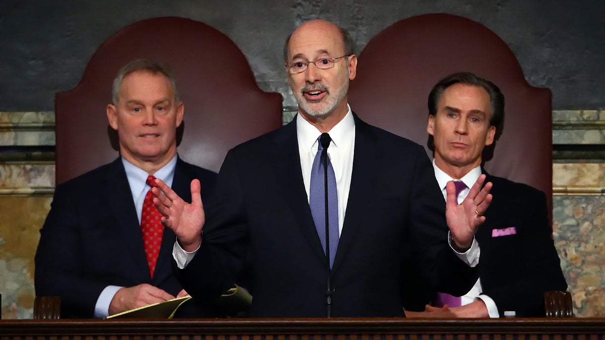  Gov. Tom Wolf, center, delivers his budget address for the 2016-17 fiscal year to a joint session of the Pennsylvania House and Senate, as the Speaker of the House Mike Turzai, R-Allegheny, left, and Lt. Gov. Mike Stack, right, listen at the State Capitol in Harrisburg Tuesday. (AP Photo/Chris Knight) 