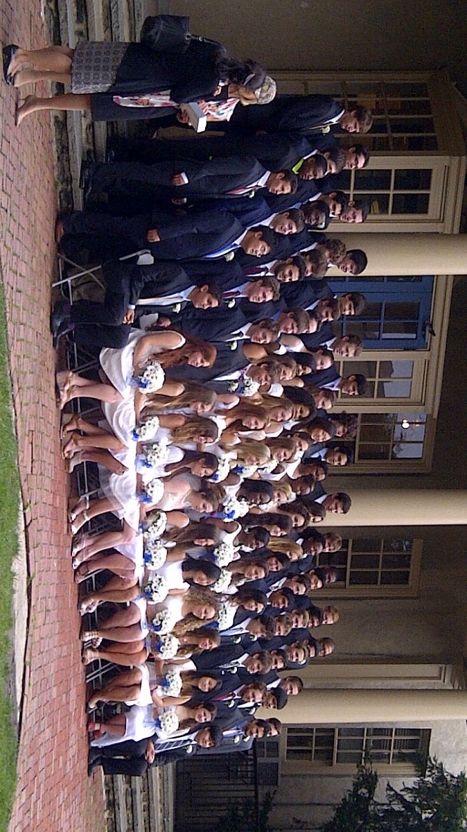  The Class of 2013 poses for a group shot outside of Germantown Friends School before heading to the Arch Street Meeting House for their commencement ceremony. (Brian Hickey/WHYY) 