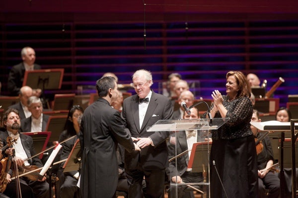 <p><p>Philadelphia Orchestra Chairman Richard Worley (center) and Orchestra CEO Allison Vulgamore applaud Concertmaster David Kim, as he receives this year's Philadelphia Orchestra Award. (Photo courtesy of Jessica Griffin)</p></p>
