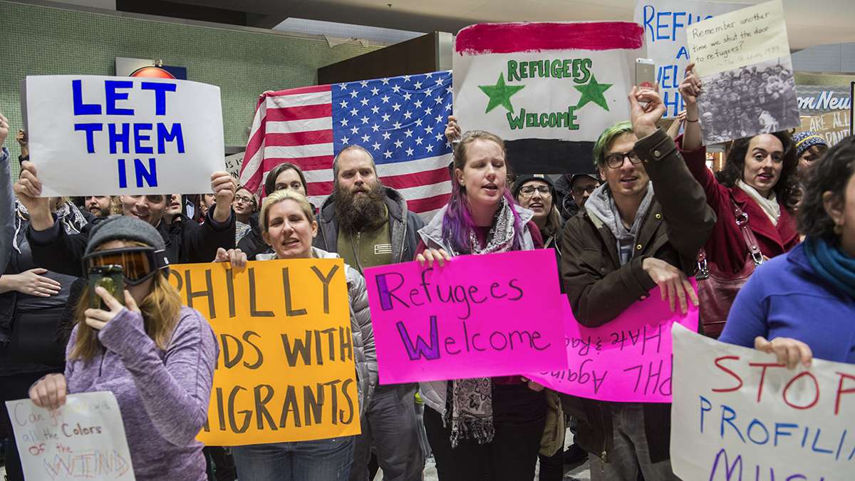 Protesters angered by President Donald Trump’s executive order that prevented refugees, visa and green card holders from entering the US chant pro-immigration slogans at Philadelphia International Airport. (Branden Eastwood for NewsWorks)