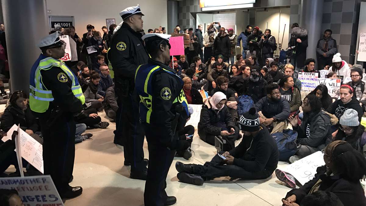 Scenes from the second day of actions at Philadelphia International Airport where people have come to protest President Trump's executive order detaining and deporting refugees. (Bastiaan Slabbers for NewsWorks)