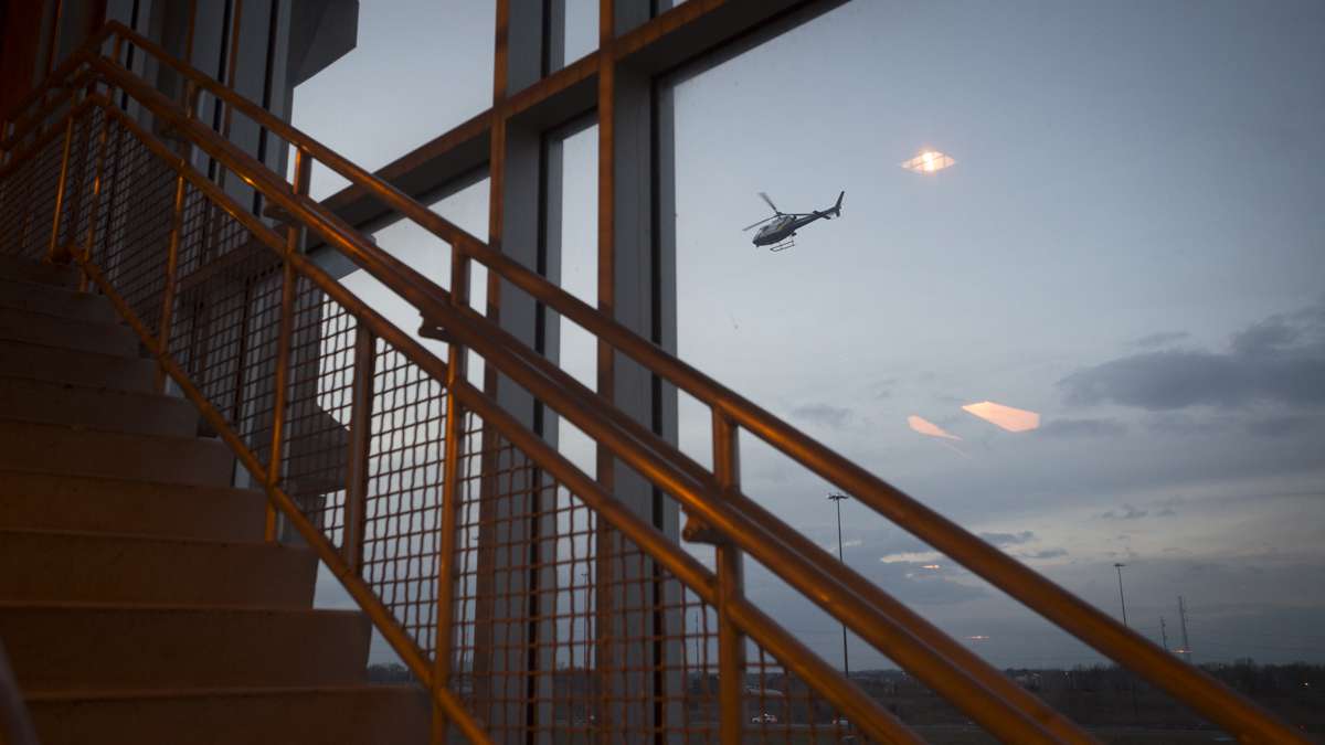A police helicopter over Philadelphia International Airport. (Branden Eastwood for NewsWorks) 