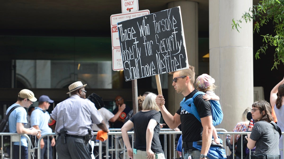  Protesters gather outside the scheduled press conference of US Attorney General Jeff Sessions at the US Attorney's Office in Center City, on Friday. (Bastiaan Slabbers for NewsWorks) 