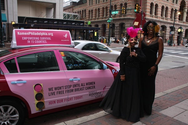 <p><p>Breast cancer survivors Jeanette Stephens-El (left) and Jackie Greggs-Walden arrive at the Pink Tie Ball in a specially decorated “awareness cab” by Freedom Taxi (Photo courtesy of Dr. Kurt Bomze)</p></p>
