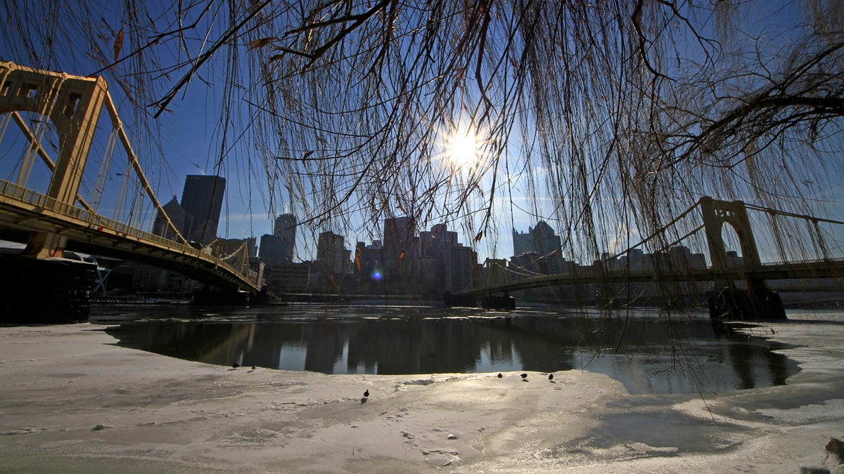  The sun hangs over the skyline of downtown Pittsburgh, beginning to melt ice on the Allegheny River. Pennsylvania cities, including Pittsburgh, ranked poorly on the Milken Institute's list of best performing metros. (AP Photo/Gene J. Puskar) 