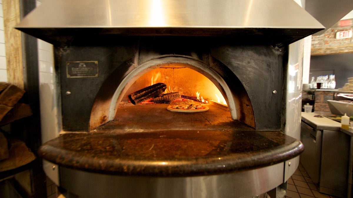  A fresh pizza in the oven at Bufad (Nathaniel Hamilton/for NewsWorks) 