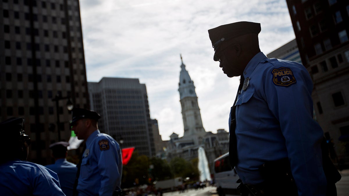  Police stand along Benjamin Franklin Parkway near City Hall while Pope Francis visited Philadelphia. Volatile markets could mean trouble for municipal pension funds and ultimately, tax payers would be on the hook to make up for low returns. (AP Photo/David Goldman)  