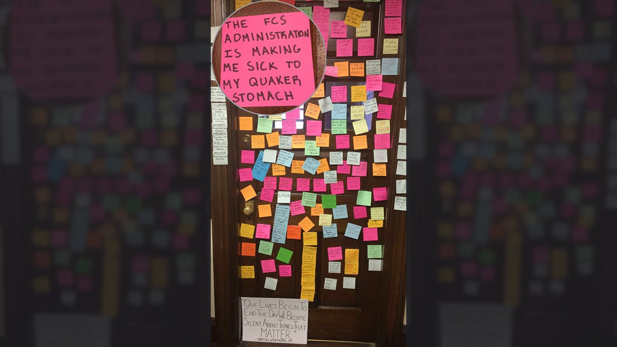  A student who asked that her name be withheld took a picture of the doors of a suspended teacher, where students have been posting notes in protest. 