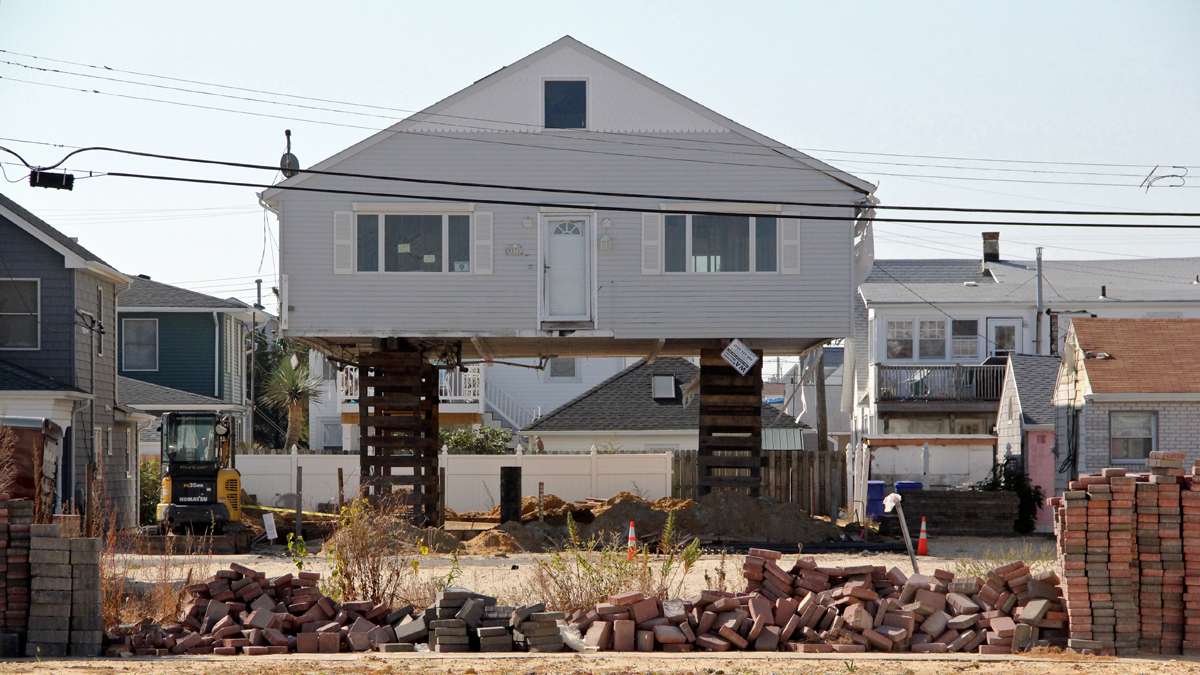 An Ortley Beach bungalow is raised to comply with building codes. (Emma Lee/WHYY)