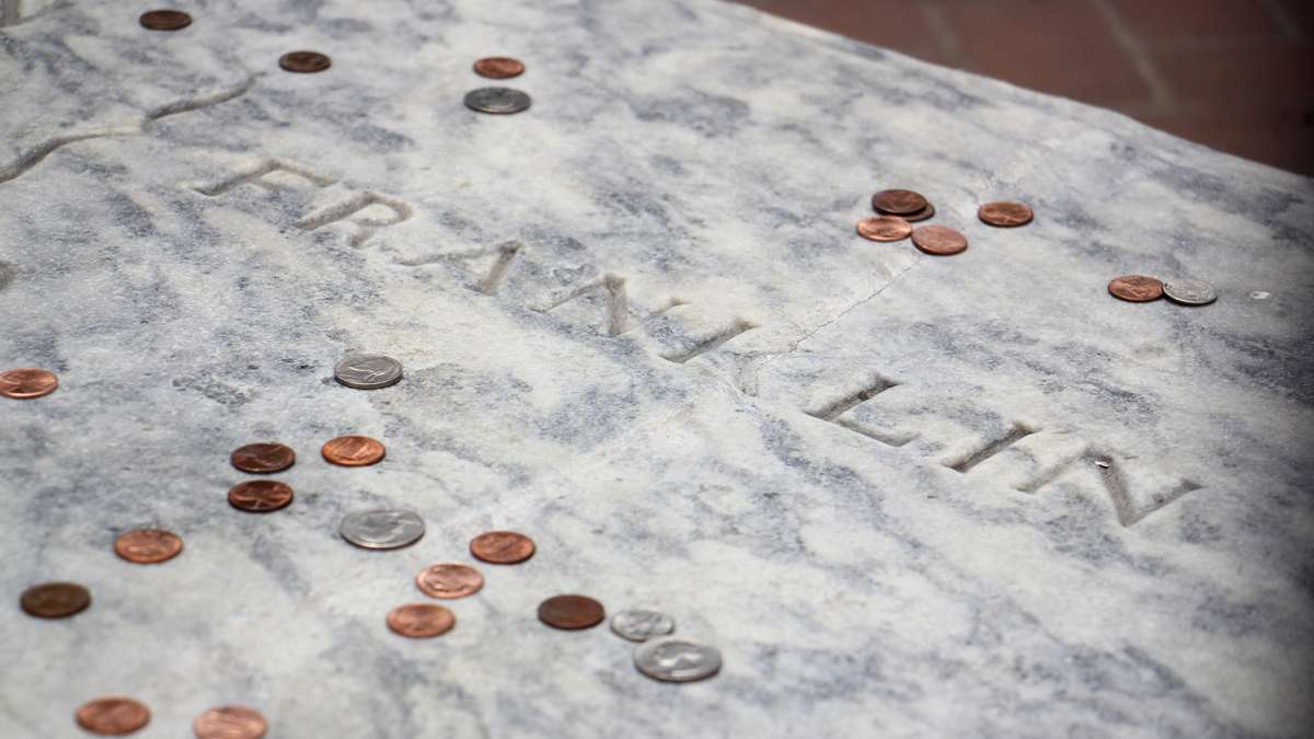 An urban legend claims that damage to Franklin's gravestone was caused by visitors dropping pennies on the marble, but the recently repaired crack was more likely caused by a renovation in the 1950s that resulted in poor drainage.