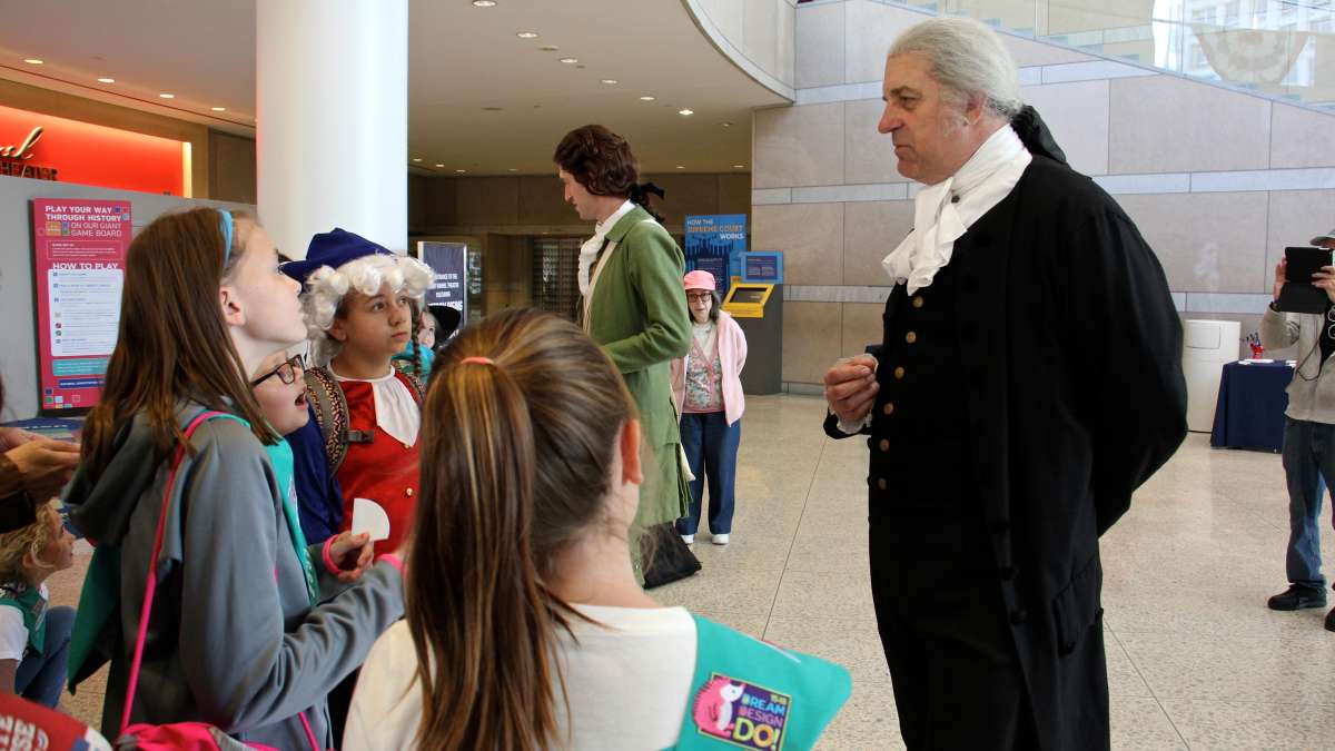 George Washington, as portrayed by John Lopes of Historic Philadelphia, addresses a group of Girl Scouts at the National Constitution Center.