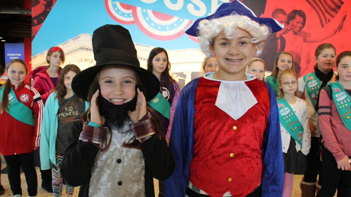 Amelia Broadway (left) and Rylee Decker of Girl Scout Troop 2945 in Newtown, Pennsylvania, portray presidents Lincoln and Washington during a trip to the National Constitution Center.